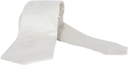 Cravatta uomo Altea in seta fantasia beige, elegante e raffinata, ideale come accessorio di moda maschile.