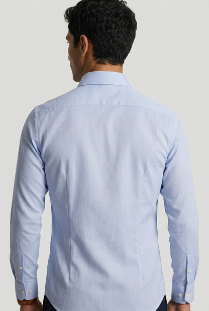 Camicia Bagutta azzurra con microfantasia.
La camicia da uomo Bagutta BC342L abbina l'azzurro a una microfantasia, per chi desidera un'alternativa alla tinta unita senza rinunciare a un look sobrio. Indossa modello retro.