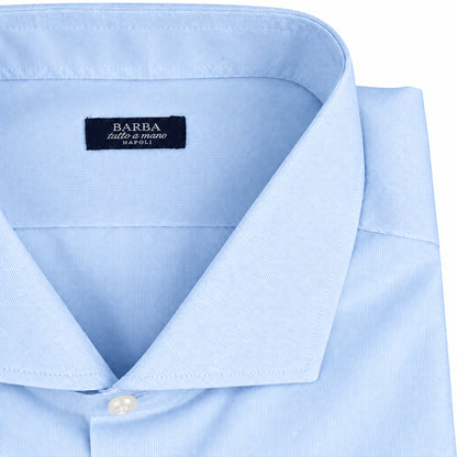 Camicia uomo Barba tinta unita colore celeste, abbigliamento moda uomo, dettaglio in tessuto e colletto.