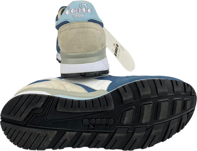 Scarpa da uomo Diadora Heritage Trident 90 C SW in blu teal, sneaker casual con design sportivo e stile classico.