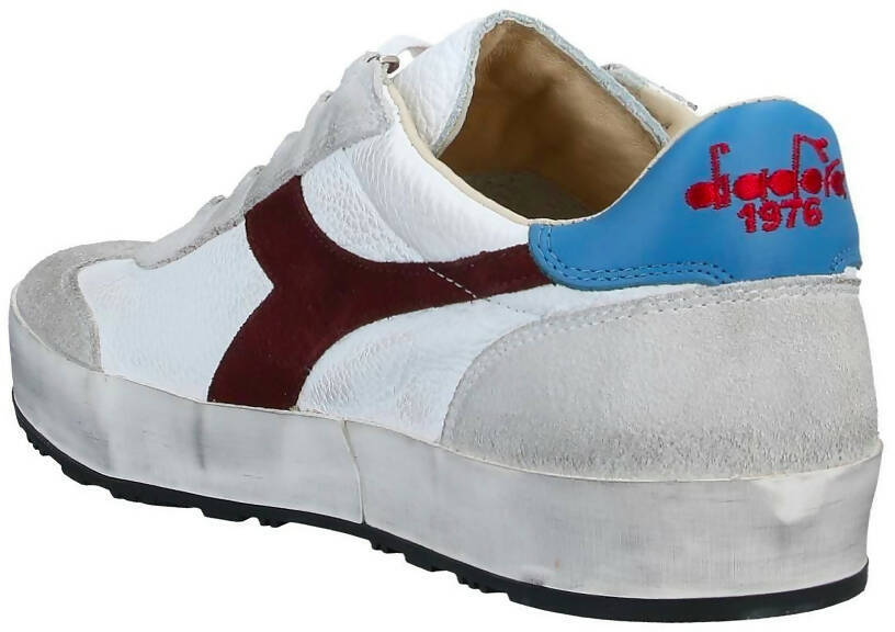 Sneaker casual da uomo Diadora Heritage B.Original H Leather, bianca con dettagli in pelle, sfumature di sporco e usura.
