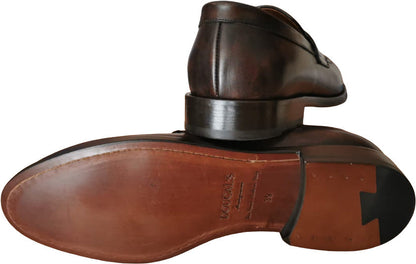Mocassini uomo Doucal's in pelle testa di moro, scarpa moda italiana, stile elegante e confortevole.