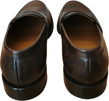 Mocassini uomo Doucal's in pelle testa di moro, scarpa loafer in stile italiano, modello elegante e di qualità.