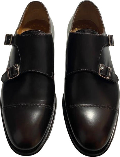 Scarpa uomo Doucal's loafer in pelle testa di moro con doppia fibbia e punta cap toe, elegante e raffinata.