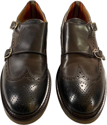 Scarpa uomo Doucal's in pelle marrone con doppia fibbia e motivo brogue, mocassino elegante in stile moda uomo.