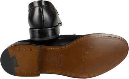 Mocassino in pelle nero Doucal's da uomo, scarpa loafer elegante e classica, perfetta per look sofisticati.