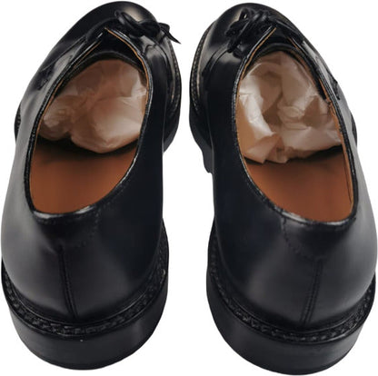 Scarpe Derby Doucal's da uomo in pelle nera, scarpe stringate basse eleganti e classiche in stile italiano.