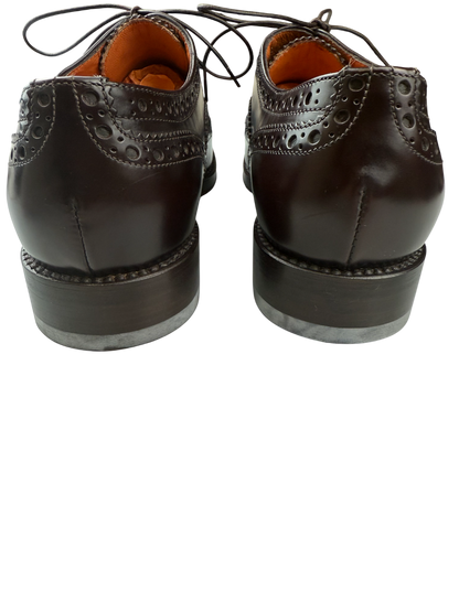 Scarpa uomo Santoni Oxford Brogue in pelle testa di moro, stile derby con dettagli eleganti e finitura di alta qualità.