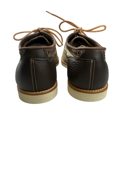 Scarpa uomo Santoni Derby Brogue Rondine in pelle marrone, dettaglio classico con perforazioni e finitura elegante.