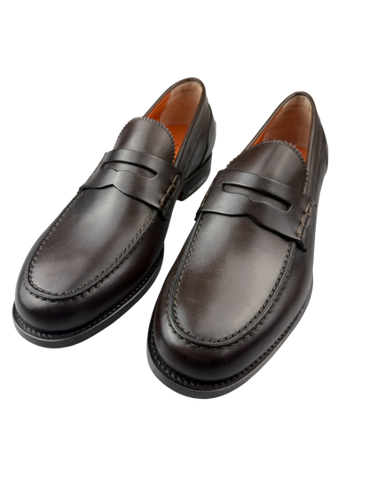 Mocassini uomo Santoni in pelle testa di moro, modello Penny, con design classico e finiture di alta qualità.