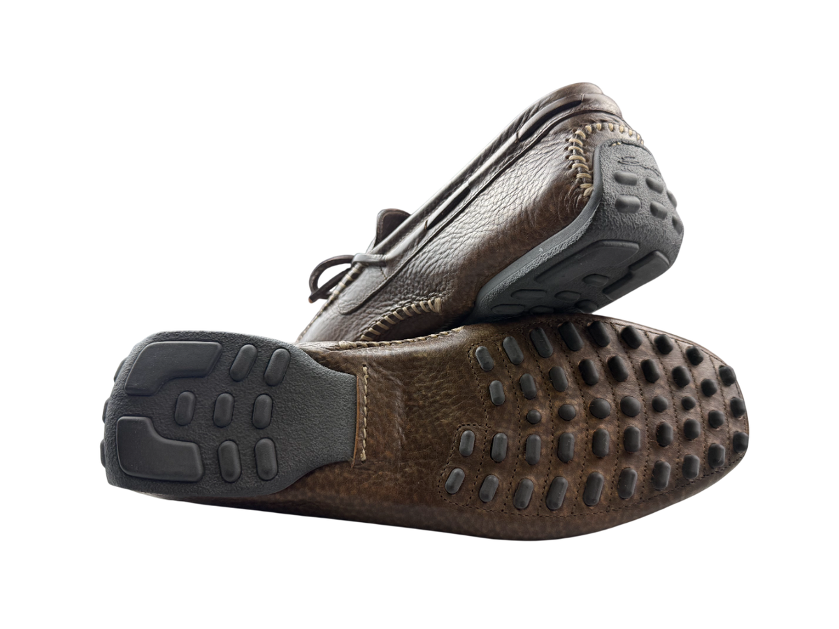 Scarpa uomo Santoni mocassini in pelle neri, stile classico con dettagli eleganti, ideali per look sofisticati.
