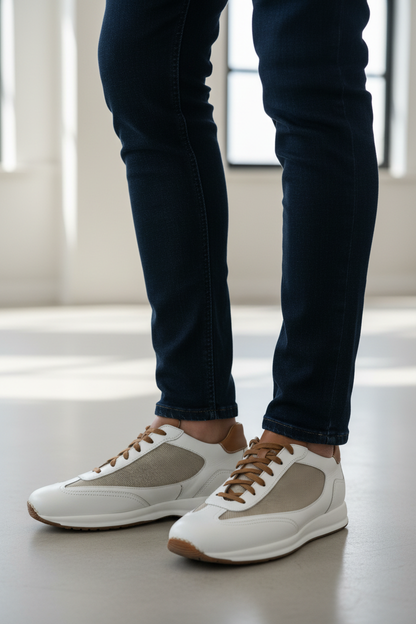 Scarpa uomo Santoni sneaker casual in pelle con design elegante, dettagli moderni e suola bianca, vista laterale.