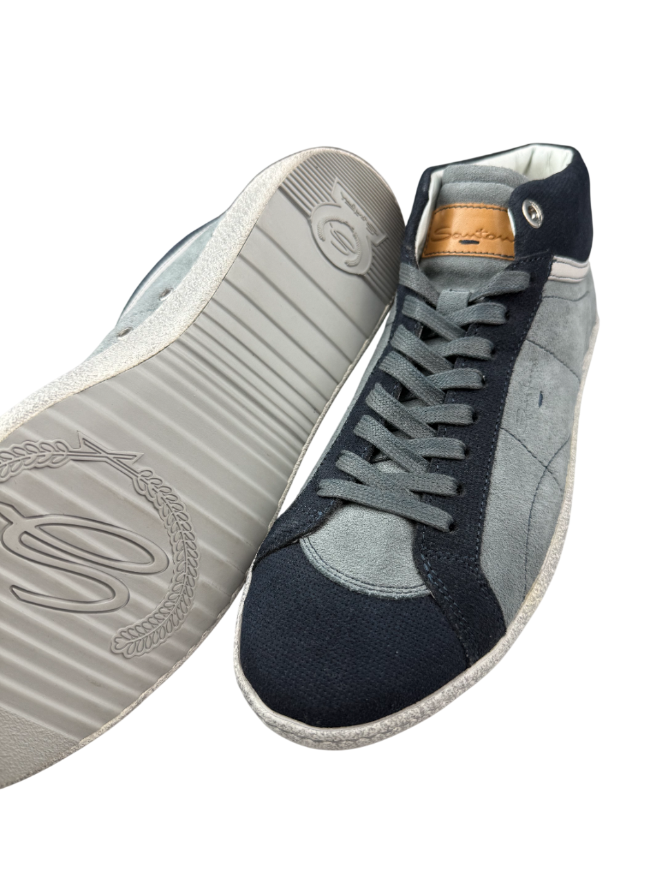 Scarpa uomo Santoni Sneaker alte in pelle nera, stile casual e moda, con suola bianca e design elegante.