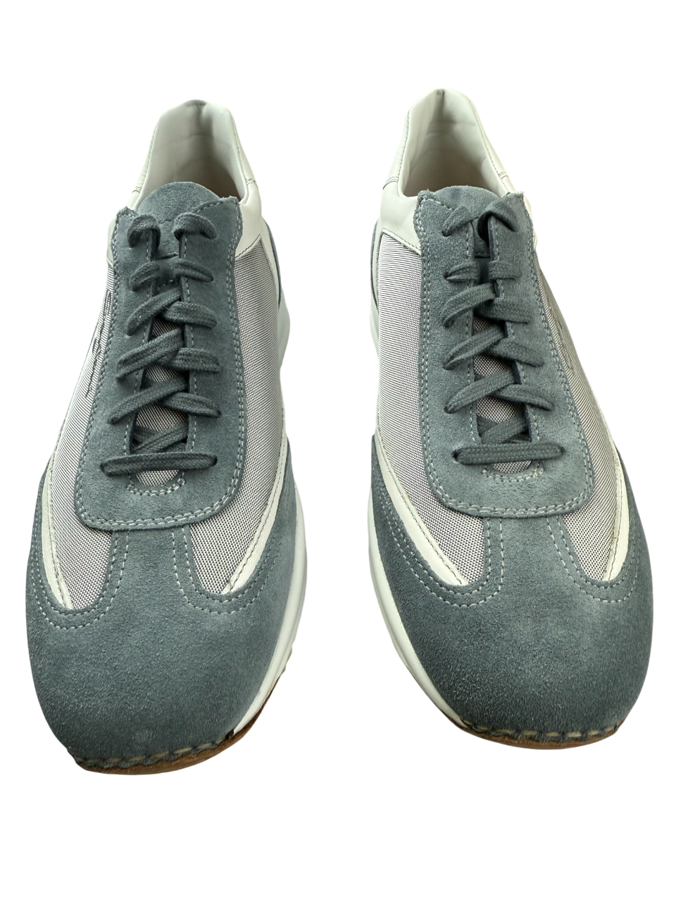 Scarpa uomo Santoni sneaker casual in pelle bianca, dettagli eleganti e suola in gomma, stile moda uomo.