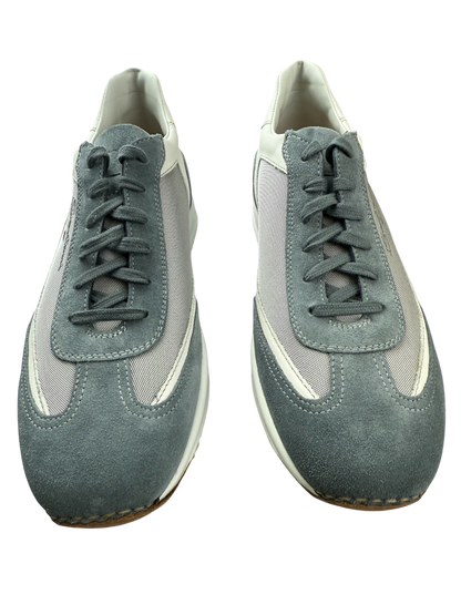 Scarpa uomo Santoni sneaker casual in pelle bianca, dettagli eleganti e suola in gomma, stile moda uomo.